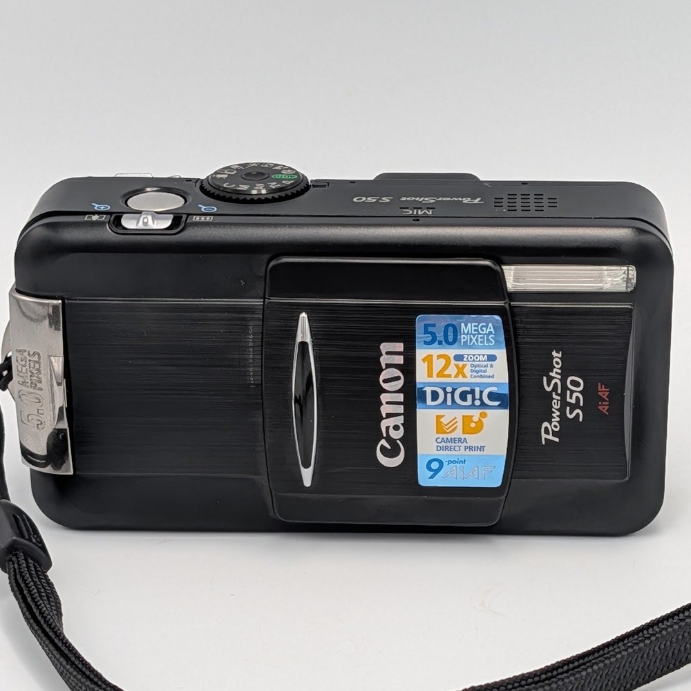 Canon PowerShot S50 5.0MP Digital Camera Black PC1048 Bundle with Charger